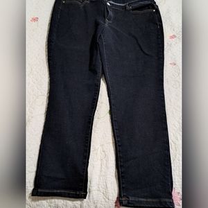 Lane Bryant size 24 dark blue mid rise skinny jeans.